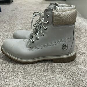 Gray woman’s timberlands